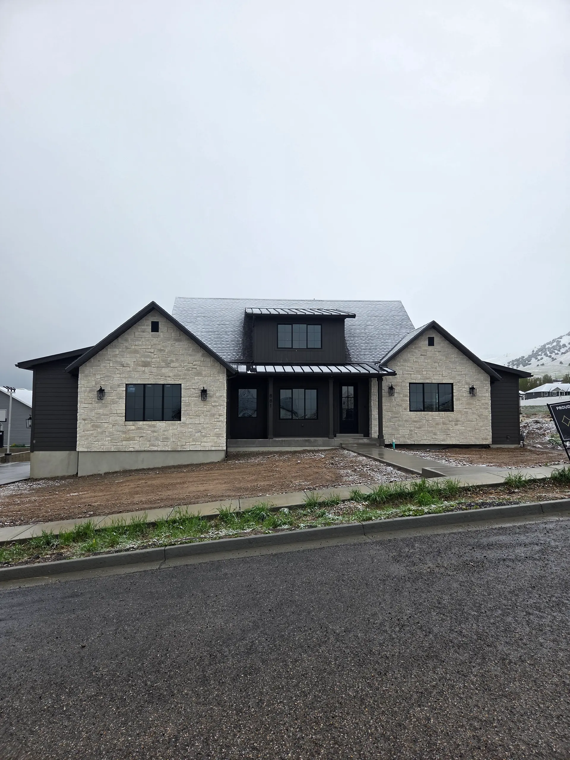 Stacked stone veneer on a custom new-build home in Cache Valley by Spackman Construction Services